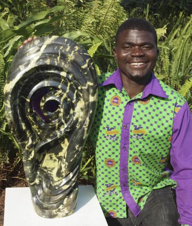 Zimbabwean sculptor Remembrance Chikuruwo portrait photo