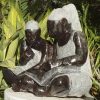 Shona sculpture Teach Me To Read by Jonathan Mhondorohuma