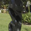 Shona sculpture The Energy Of Life by Munyaradzi Jeche - front right