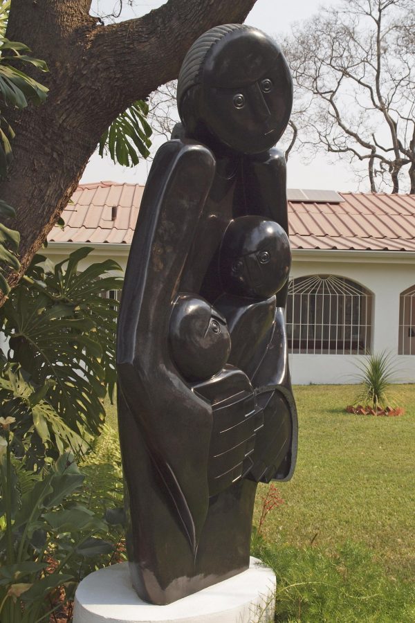 Shona stone sculpture Protective Mother by Edward Chiwawa - front left