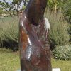 Shona stone sculpture Fortune Teller by Edward Chiwawa - left side