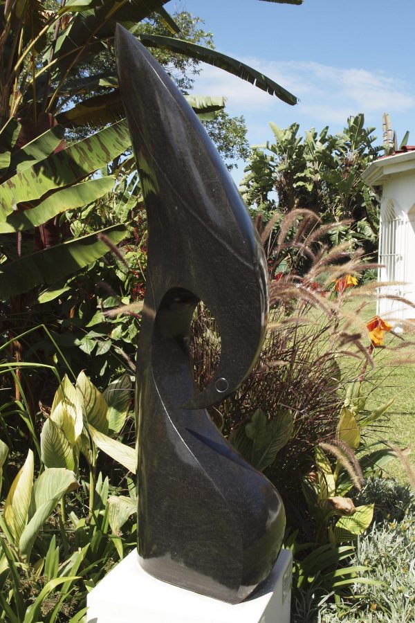 Abstract Shona stone sculpture Kingfisher by Nesbert Mukomberanwa front left