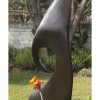 Abstract Shona stone sculpture Kingfisher by Nesbert Mukomberanwa right side back