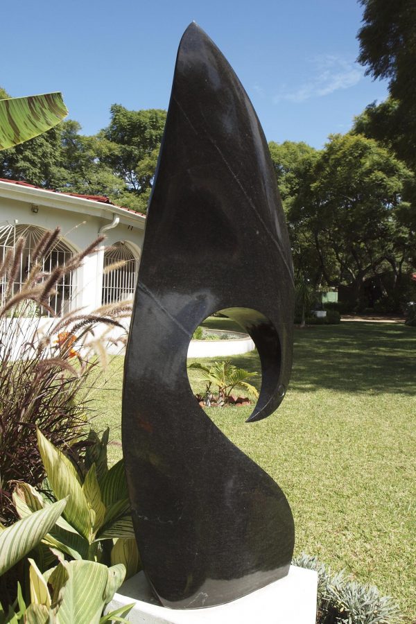 Abstract Shona stone sculpture Kingfisher by Nesbert Mukomberanwa back right