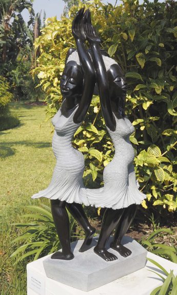 Garden sculpture two girls Party Day by Rufaro Murenza main image