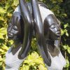 Garden sculpture two girls Party Day by Rufaro Murenza close up
