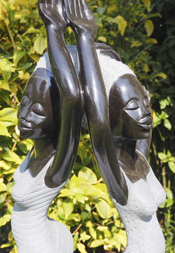 Garden sculpture two girls Party Day by Rufaro Murenza close up