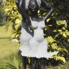 Garden sculpture two girls Party Day by Rufaro Murenza front right