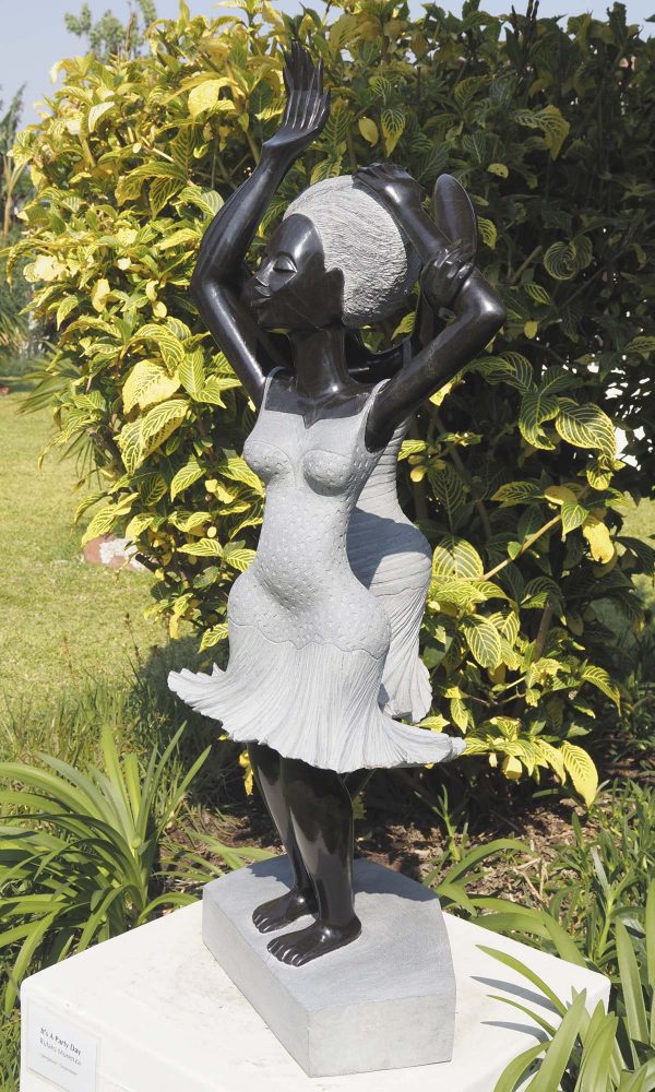 Garden sculpture two girls Party Day by Rufaro Murenza right side