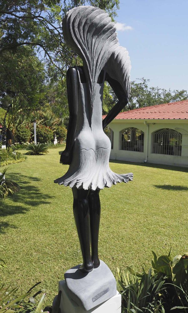 Female woman stone sculpture - Supermodel by Rufaro Murenza back left