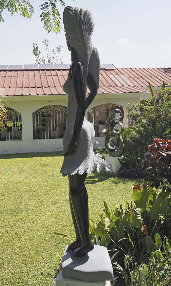 Female woman stone sculpture - Supermodel by Rufaro Murenza right side