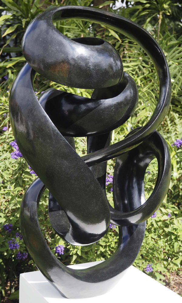 Abstract Shona stone sculpture - Here For You by Tonderai Sowa back left