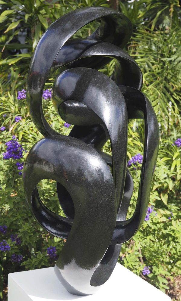 Abstract Shona stone sculpture - Here For You by Tonderai Sowa left side