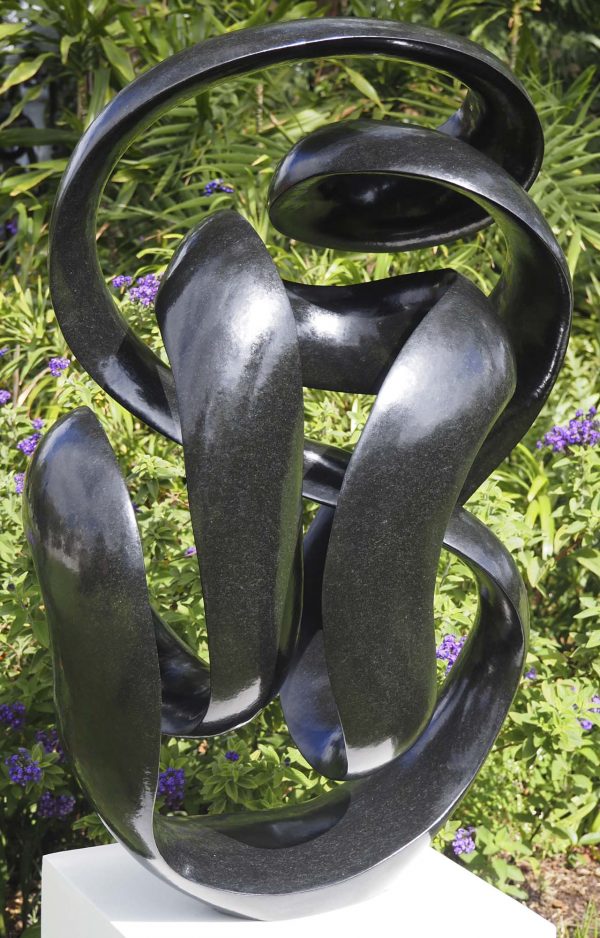 Abstract Shona stone sculpture - Here For You by Tonderai Sowa front left