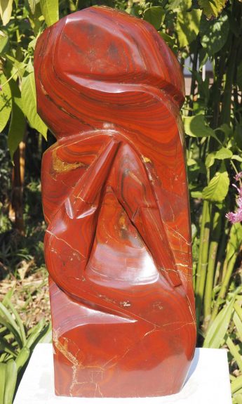 Birds sculpture red stone Tickling by Tago Tazvitya main image