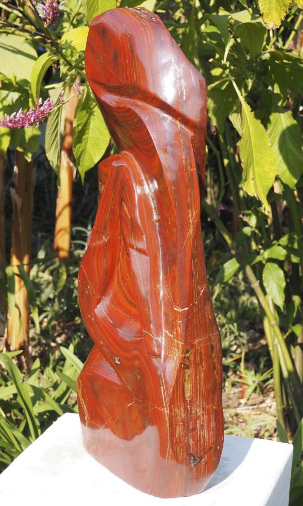 Birds sculpture red stone Tickling by Tago Tazvitya right side