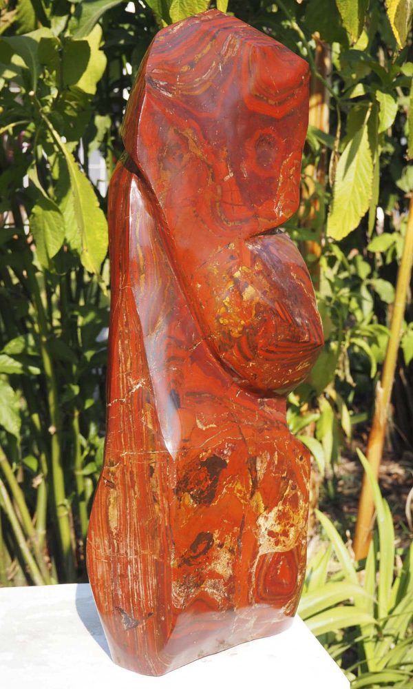 Birds sculpture red stone Tickling by Tago Tazvitya back left