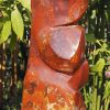 Birds sculpture red stone Tickling by Tago Tazvitya back