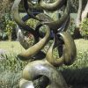 Abstract stone garden sculpture Achievements by Willard Bopoto back