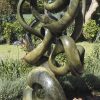 Abstract stone garden sculpture Achievements by Willard Bopoto back right