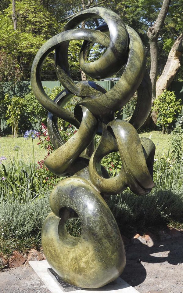 Abstract stone garden sculpture Achievements by Willard Bopoto back right