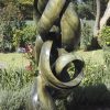 Abstract stone garden sculpture Achievements by Willard Bopoto left side