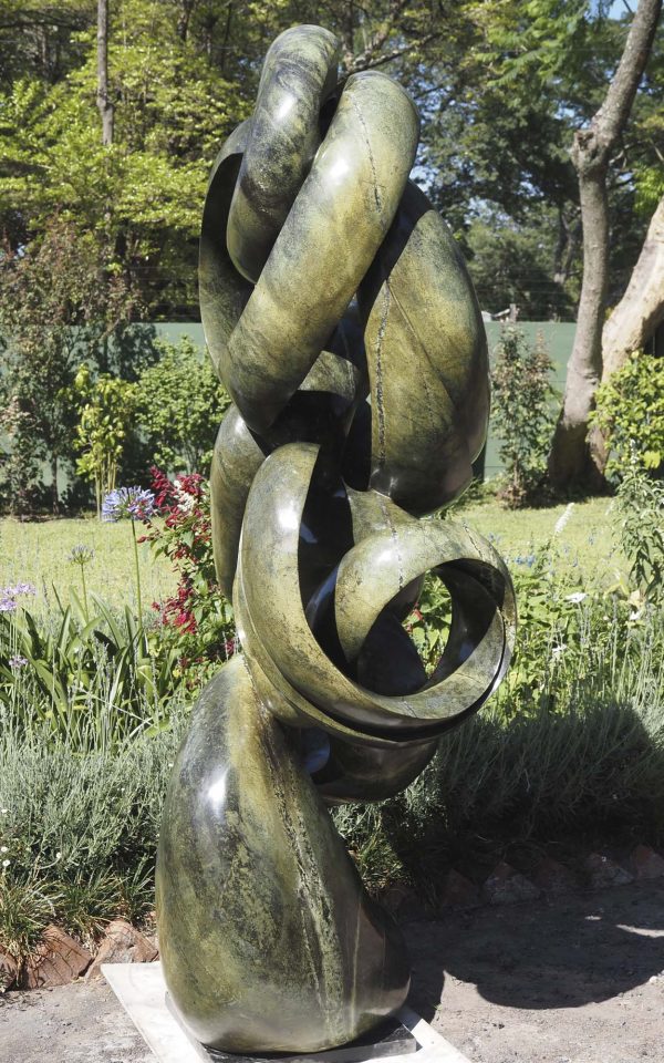 Abstract stone garden sculpture Achievements by Willard Bopoto left side
