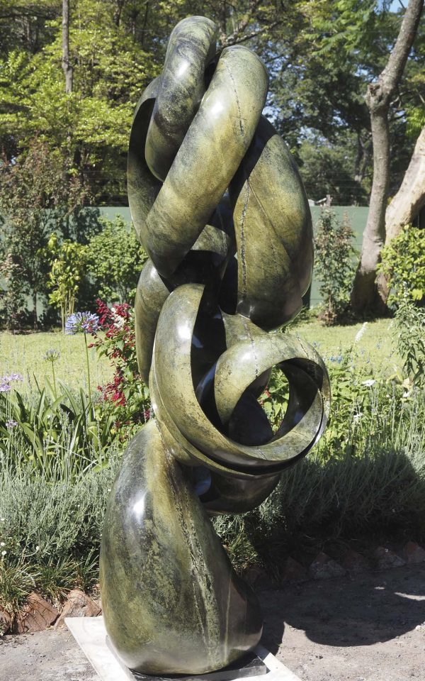 Abstract stone garden sculpture Achievements by Willard Bopoto left side