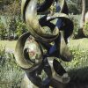 Abstract stone garden sculpture Achievements by Willard Bopoto front left