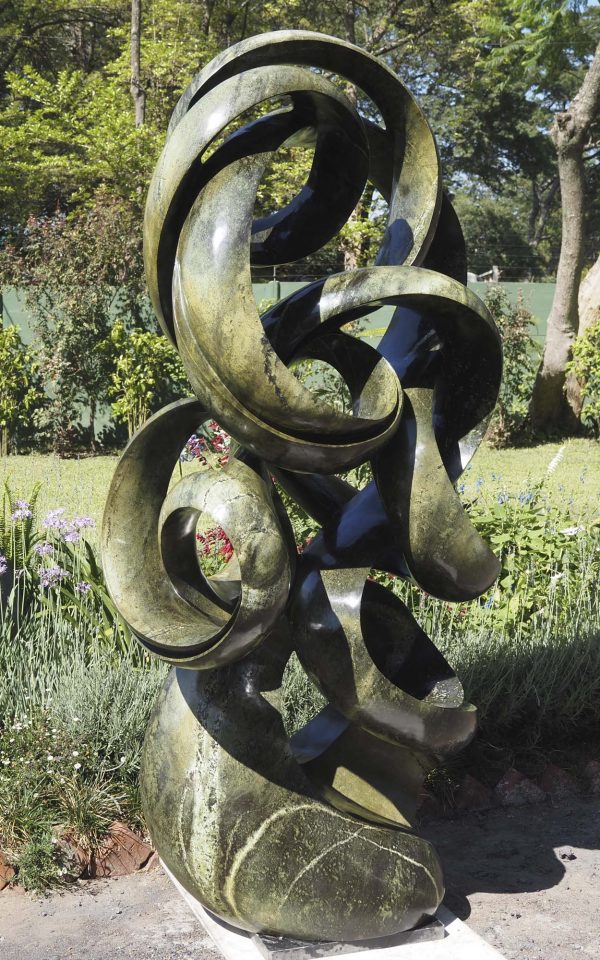 Abstract stone garden sculpture Achievements by Willard Bopoto front left