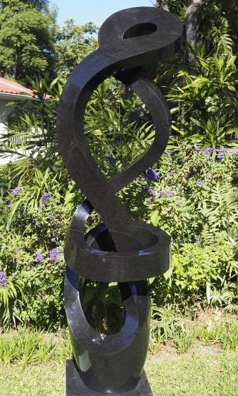 Large abstract Shona stone sculpture - Protecting Bride by Charles Kowo main image