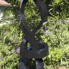 Large abstract Shona stone sculpture - Protecting Bride by Charles Kowo front right