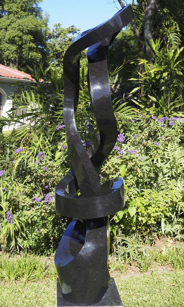 Large abstract Shona stone sculpture - Protecting Bride by Charles Kowo right side