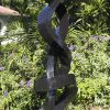 Large abstract Shona stone sculpture - Protecting Bride by Charles Kowo back left