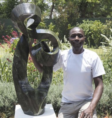 Shona sculptor Charles Kowo from Zimbabwe