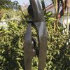 Abstract stone sculpture black and white - Joyful Moment by Isaac Choloka back