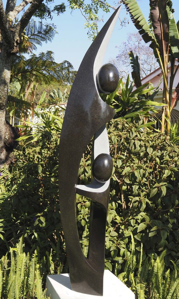 Abstract stone sculpture black and white - Joyful Moment by Isaac Choloka front left