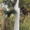 Garden stone bird sculpture - Preening Flamingo by Peter Chidzonga front right