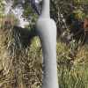 Garden stone bird sculpture - Preening Flamingo by Peter Chidzonga back left