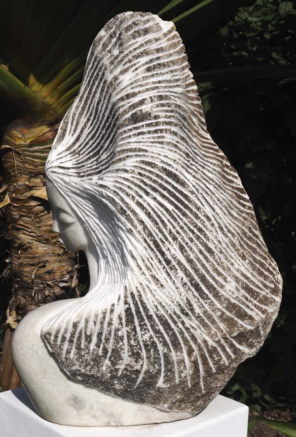 White marble bust head Staying Positive by Tutani Mgabazi right side