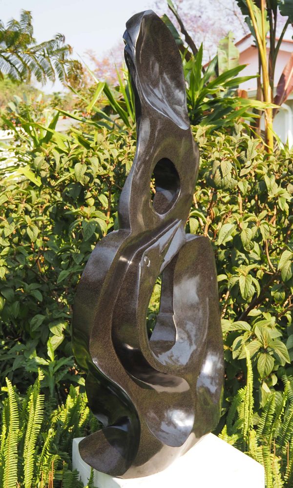 Garden stone bird sculpture - Joy Of Togetherness by Tago Tazvitya back left