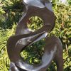 Garden stone bird sculpture - Joy Of Togetherness by Tago Tazvitya back
