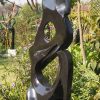 Garden stone bird sculpture - Joy Of Togetherness by Tago Tazvitya back right
