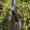 Garden stone bird sculpture - Joy Of Togetherness by Tago Tazvitya left side