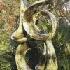 Large abstract stone sculpture - Treasures by Willard Bopoto front right