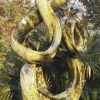 Large abstract stone sculpture - Treasures by Willard Bopoto front left
