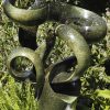Abstract garden stone sculpture - Growing Force by Willard Bopoto front