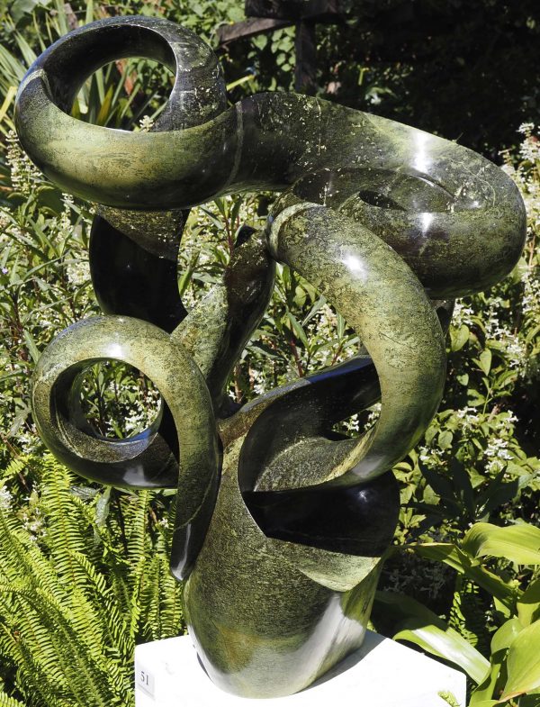 Abstract garden stone sculpture - Growing Force by Willard Bopoto front
