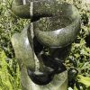 Abstract garden stone sculpture - Growing Force by Willard Bopoto front right from above