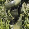 Abstract garden stone sculpture - Growing Force by Willard Bopoto right side